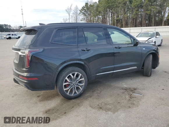 2023 Cadillac XT6 AWD Sport with VIN 1GYKPHRS3PZ150630, listed as a Copart auction lot 43557595 with 54,299 mi miles and Salvage title. Bid and sale history available at DreamBid. Image 3.