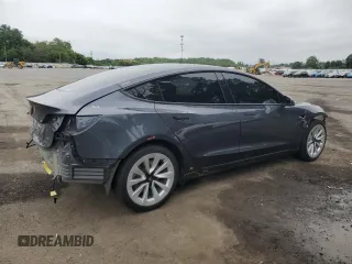 2023 Tesla Model 3 with VIN 5YJ3E1EA1PF678225, listed as a Copart auction lot 62634945 with 24,932 mi miles and Salvage title. Bid and sale history available at DreamBid. Image 3.