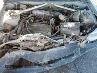 1987 Toyota Corolla с VIN 1NXAE87G6HZ400863, выставлен на аукционе Copart как лот 46637575 с пробегом 241 705 миль миль и Списание • Salvage title. История ставок и продаж доступна на DreamBid. Изображение 12.
