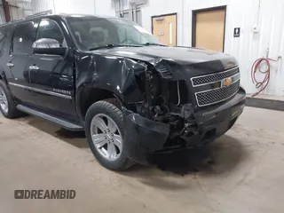 2012 Chevrolet Suburban LTZ with VIN 1GNSKKE77CR326924, listed as a IAAI auction lot 41764487 with 198,224 mi miles. Bid and sale history available at carsss.com. Image 1.