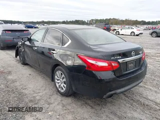 2016 Nissan Altima S with VIN 1N4AL3AP7GC262539, listed as a IAAI auction lot 40957360 with 158,613 mi miles and . Bid and sale history available at DreamBid. Image 3.
