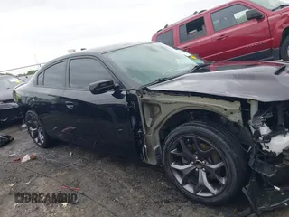 2018 Dodge Charger SXT Plus with VIN 2C3CDXHG0JH289216, listed as a IAAI auction lot 42085449 with 90,902 mi miles and . Bid and sale history available at DreamBid. Image 14.