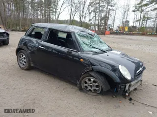 2005 MINI Cooper Hardtop with VIN WMWRC33445TJ64482, listed as a IAAI auction lot 41798048 with 115,656 mi miles. Bid and sale history available at carsss.com. Image 1.