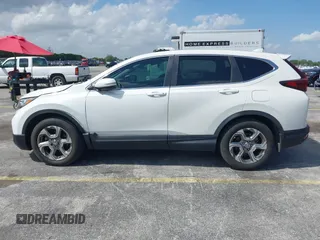 2019 Honda CR-V EX with VIN 5J6RW1H51KA007719, listed as a IAAI auction lot 41985574 with 58,696 mi miles. Bid and sale history available at carsss.com. Image 14.