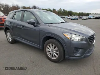 2016 Mazda CX-5 Sport with VIN JM3KE2BE8G0761648, listed as a Copart auction lot 81750854 with 191,384 mi miles and Clean Title. Bid and sale history available at DreamBid. Image 4.
