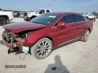 2014 Cadillac XTS Premium with VIN 2G61P5S33E9318036, listed as a Copart auction lot 77262324 with 131,588 mi miles and Salvage Title. Bid and sale history available at carsss.com. Image 1.