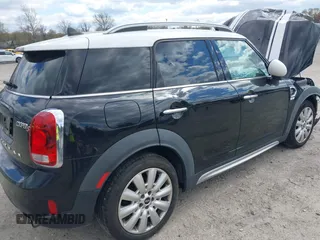 2019 MINI Countryman Cooper S z VIN WMZYT3C53K3E97116, wystawiony jako IAAI lot #42059638 z przebiegiem 72 951 mil mil oraz . Historia ofert i sprzedaży dostępna na DreamBid. Obrazek 4.