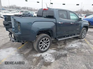 2019 GMC Canyon 4WD Denali with VIN 1GTG6EENXK1321734, listed as a IAAI auction lot 41491402 with 60,026 mi miles. Bid and sale history available at carsss.com. Image 4.