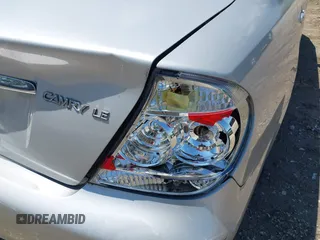 2006 Toyota Camry STD z VIN 4T1BE32K46U725379, wystawiony jako IAAI lot #42247594 z przebiegiem 83 586 mil mil oraz . Historia ofert i sprzedaży dostępna na DreamBid. Obrazek 12.