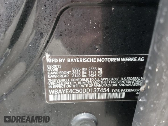2013 BMW 7 Series 740Li with VIN WBAYE4C50DD137454, listed as a Copart auction lot 84876294 with Not provided miles and Salvage title. Bid and sale history available at DreamBid. Image 12.