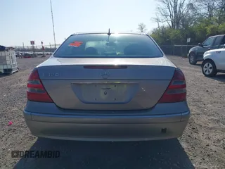 2003 Mercedes-Benz E-Class 3.2L with VIN WDBUF65J93X099223, listed as a IAAI auction lot 42033473 with 230,758 mi miles. Bid and sale history available at carsss.com. Image 16.