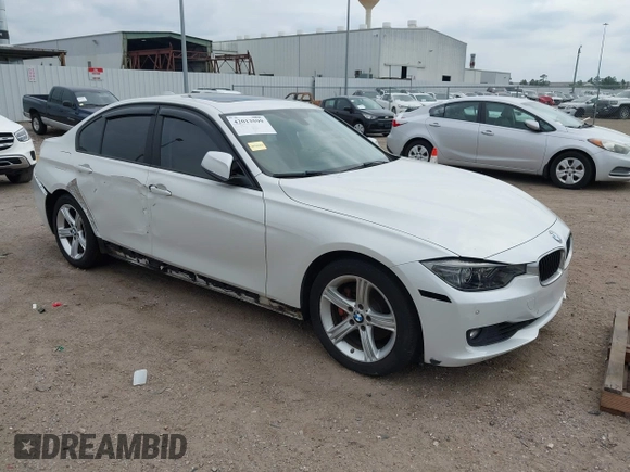 2012 BMW 3 Series 328i with VIN WBA3A5C51CF349987, listed as a IAAI auction lot 42013599 with 256,461 mi miles. Bid and sale history available at carsss.com. Image 1.