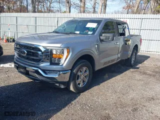 2021 Ford F-150 XL with VIN 1FTFW1E85MKD11754, listed as a IAAI auction lot 41654622 with 33,756 mi miles. Bid and sale history available at carsss.com. Image 2.