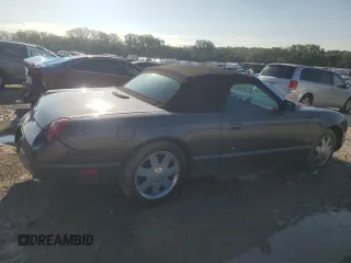 2003 Ford Thunderbird Deluxe z VIN 1FAHP60A63Y107026, wystawiony jako Copart lot #70650964 z przebiegiem 36 115 mil mil oraz Szkoda całkowita • Salvage title. Historia ofert i sprzedaży dostępna na DreamBid. Obrazek 3.