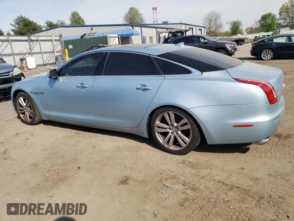 2013 Jaguar XJ Portfolio with VIN SAJWJ2GD3D8V47879, listed as a Copart auction lot 54558195 with 99,500 mi miles and Clean Title. Bid and sale history available at DreamBid. Image 2.
