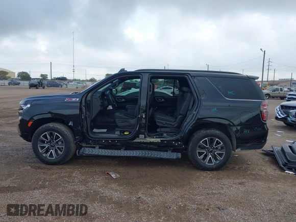2023 Chevrolet Tahoe Z71 with VIN 1GNSKPKD9PR389603, listed as a IAAI auction lot 42082916 with 33,843 mi miles and . Bid and sale history available at DreamBid. Image 15.