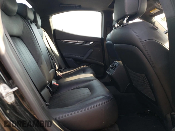 2018 Maserati Ghibli S Q4 z VIN ZAM57YTA5J1279909, wystawiony jako Copart lot #54559285 z przebiegiem 49 065 mil mil oraz Szkoda całkowita • Salvage title. Historia ofert i sprzedaży dostępna na DreamBid. Obrazek 10.