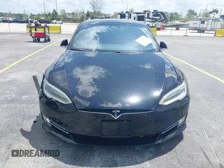 2017 Tesla Model S 100D with VIN 5YJSA1E47HF185734, listed as a IAAI auction lot 42076544 with 56,682 mi miles. Bid and sale history available at carsss.com. Image 11.