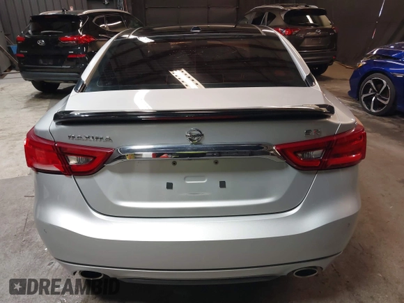 2016 Nissan Maxima SV z VIN 1N4AA6AP4GC415952, wystawiony jako IAAI lot #41806306 z przebiegiem 131 612 mil mil oraz . Historia ofert i sprzedaży dostępna na DreamBid. Obrazek 17.