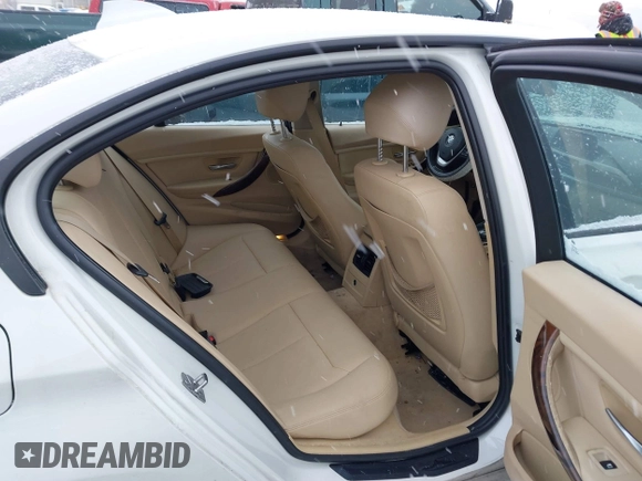 2014 BMW 3 Series 328i with VIN WBA3C1C51EK106435, listed as a IAAI auction lot 41202983 with 142,135 mi miles. Bid and sale history available at carsss.com. Image 8.