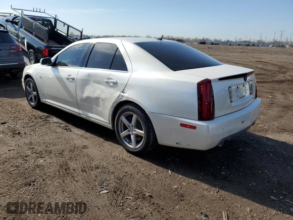 2007 Cadillac STS z VIN 1G6DW677070125177, wystawiony jako Copart lot #54316725 z przebiegiem 154 895 mil mil oraz Szkody całkowita. Historia ofert i sprzedaży dostępna na DreamBid. Obrazek 2.