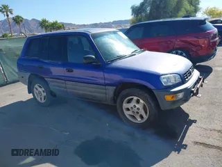 1998 Toyota RAV4 with VIN JT3GP10V0W0023657, listed as a IAAI auction lot 42169885 with 211,694 mi miles and . Bid and sale history available at DreamBid. Image 1.