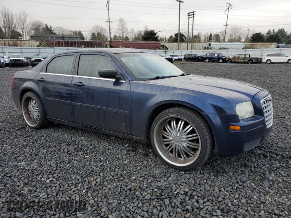 2005 Chrysler 300 with VIN 2C3JA43R75H169166, listed as a Copart auction lot 84252574 with 181,634 mi miles and Salvage Title. Bid and sale history available at carsss.com. Image 4.