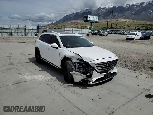 2016 Mazda CX-9 Signature with VIN JM3TCBEY7G0118322, listed as a Copart auction lot 54826655 with 123,618 mi miles and Salvage title. Bid and sale history available at DreamBid. Image 14.