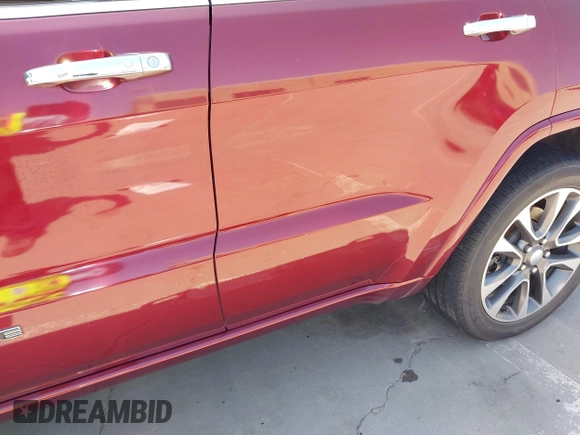 2017 Jeep Grand Cherokee Overland with VIN 1C4RJFCTXHC676236, listed as a IAAI auction lot 42164645 with 94,658 mi miles and . Bid and sale history available at DreamBid. Image 6.