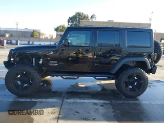 2018 Jeep Wrangler JK Unlimited Sport S with VIN 1C4BJWDG7JL818843, listed as a IAAI auction lot 41506058 with 43,563 mi miles. Bid and sale history available at carsss.com. Image 15.