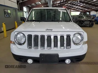 2014 Jeep Patriot Latitude with VIN 1C4NJRFB3ED766143, listed as a Copart auction lot 57879215 with 145,733 mi miles and Clean title. Bid and sale history available at DreamBid. Image 5.