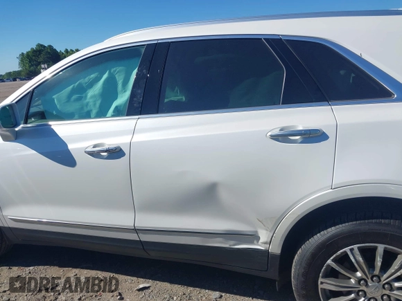 2017 Cadillac XT5 Luxury FWD with VIN 1GYKNBRS1HZ304062, listed as a IAAI auction lot 42460981 with 77,310 mi miles and . Bid and sale history available at DreamBid. Image 14.