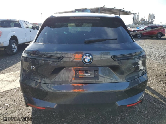 2023 BMW iX xDrive50 with VIN WB523CF02PCM92379, listed as a Copart auction lot 47726814 with 7,721 mi miles. Bid and sale history available at carsss.com. Image 6.