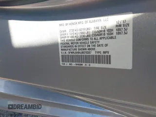 2018 Honda Odyssey Touring with VIN 5FNRL6H84JB070387, listed as a IAAI auction lot 41835852 with 98,662 mi miles. Bid and sale history available at carsss.com. Image 9.