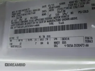2013 Ford Econoline Cargo Commercial with VIN 1FTNE2EL6DDB01466, listed as a IAAI auction lot 41172240 with 173,124 mi miles and . Bid and sale history available at DreamBid. Image 9.