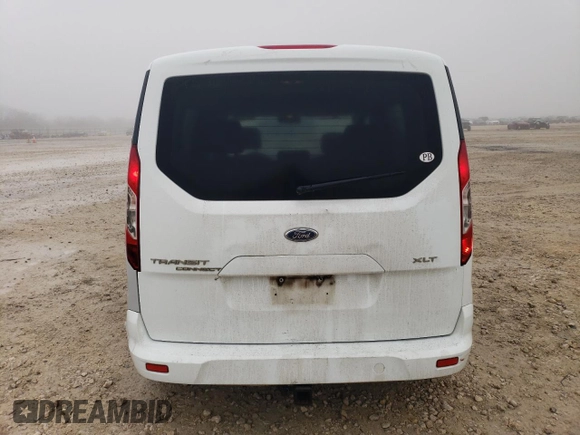 2014 Ford Transit Connect XLT with VIN NM0AE8F76E1149794, listed as a Copart auction lot 43130385 with 210,682 mi miles and Salvage title. Bid and sale history available at DreamBid. Image 6.