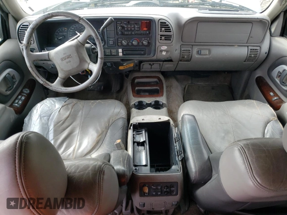 1999 GMC Denali with VIN 1GKEK13R0XR915053, listed as a Copart auction lot 49241145 with 2,664,121 mi miles and Salvage Title. Bid and sale history available at carsss.com. Image 8.