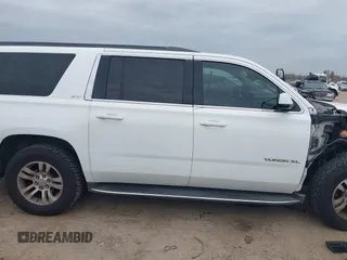 2015 GMC Yukon XL SLT with VIN 1GKS1HKCXFR652337, listed as a IAAI auction lot 41330287 with 139,268 mi miles. Bid and sale history available at carsss.com. Image 14.