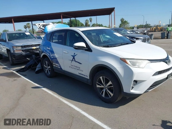 2018 Toyota RAV4 XLE with VIN 2T3WFREV7JW480326, listed as a IAAI auction lot 42021965 with 174,347 mi miles. Bid and sale history available at carsss.com. Image 1.