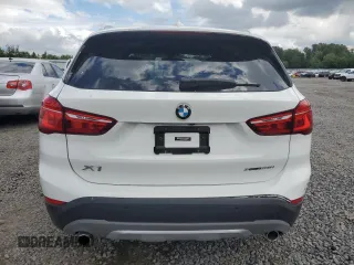 2018 BMW X1 xDrive28i with VIN WBXHT3C35J5L29298, listed as a Copart auction lot 59041435 with 27,612 mi miles and Salvage title. Bid and sale history available at DreamBid. Image 6.