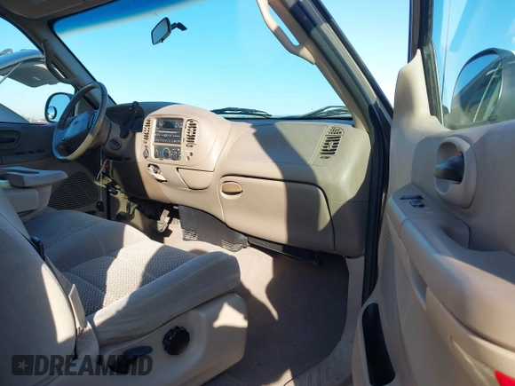2001 Ford F-150 XL with VIN 1FTRX18L31NA75349, listed as a IAAI auction lot 40921255 with 165,872 mi miles. Bid and sale history available at carsss.com. Image 5.