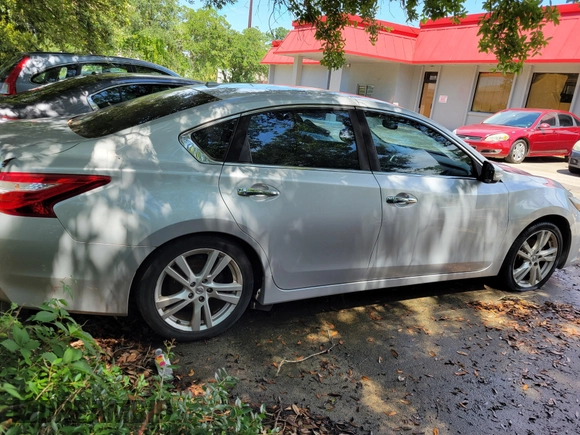 2016 Nissan Altima SL with VIN 1N4BL3AP8GC158954, listed as a IAAI auction lot 42718057 with 185,205 mi miles and . Bid and sale history available at DreamBid. Image 4.