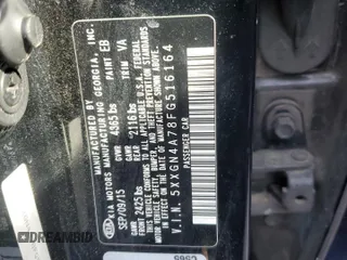 2015 Kia Optima EX with VIN 5XXGN4A78FG516164, listed as a Copart auction lot 57143165 with 130,945 mi miles and Salvage title. Bid and sale history available at DreamBid. Image 12.