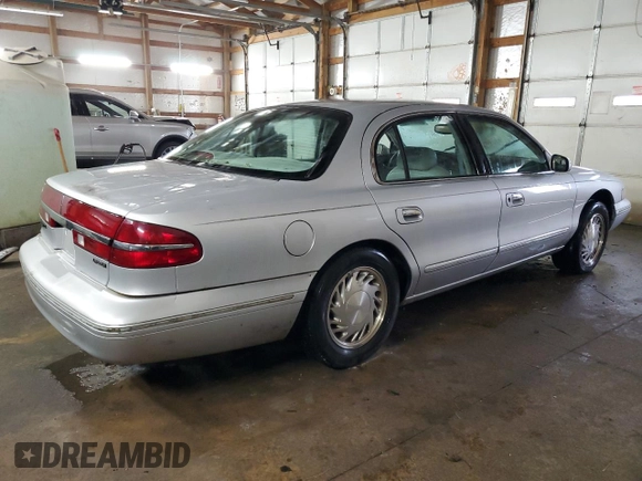 1997 Lincoln Continental with VIN 1LNLM97V0VY672751, listed as a Copart auction lot 89367315 with 132,659 mi miles and Salvage Title. Bid and sale history available at carsss.com. Image 3.