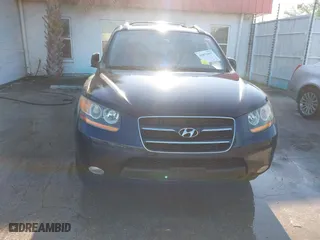 2009 Hyundai Santa Fe SE with VIN 5NMSH13E69H234946, listed as a IAAI auction lot 41876967 with 182,437 mi miles. Bid and sale history available at carsss.com. Image 6.