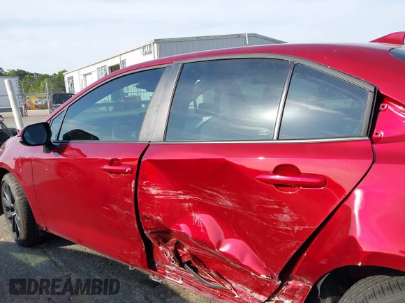 2023 Toyota Corolla SE with VIN 5YFS4MCE8PP167962, listed as a IAAI auction lot 42010518 with 5,648 mi miles and . Bid and sale history available at DreamBid. Image 14.