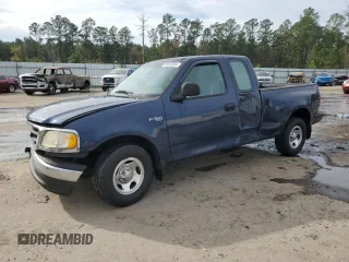 2003 Ford F-150 XL with VIN 1FTRX07273KB66549, listed as a Copart auction lot 83552004 with 205,026 mi miles and Salvage title. Bid and sale history available at DreamBid. Image 1.