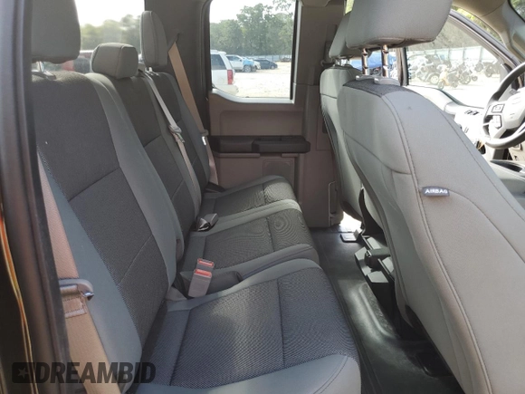 2018 Ford F-150 XL with VIN 1FTEX1CB0JFB12963, listed as a Copart auction lot 51076365 with 107,086 mi miles and Salvage Title. Bid and sale history available at carsss.com. Image 10.