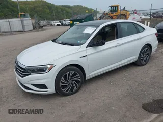 2020 Volkswagen Jetta SEL z VIN 3VWEB7BU3LM073029, wystawiony jako IAAI lot #42168239 z przebiegiem 59 395 mil mil oraz . Historia ofert i sprzedaży dostępna na DreamBid. Obrazek 17.