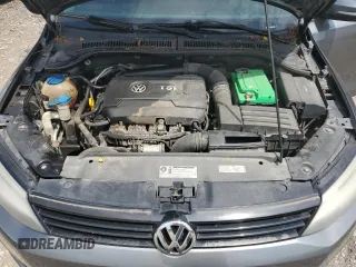 2014 Volkswagen Jetta SE z VIN 3VWD07AJ7EM395250, wystawiony jako Copart lot #65821005 z przebiegiem 155 293 mil mil oraz Czysty tytuł • Clean title. Historia ofert i sprzedaży dostępna na DreamBid. Obrazek 11.